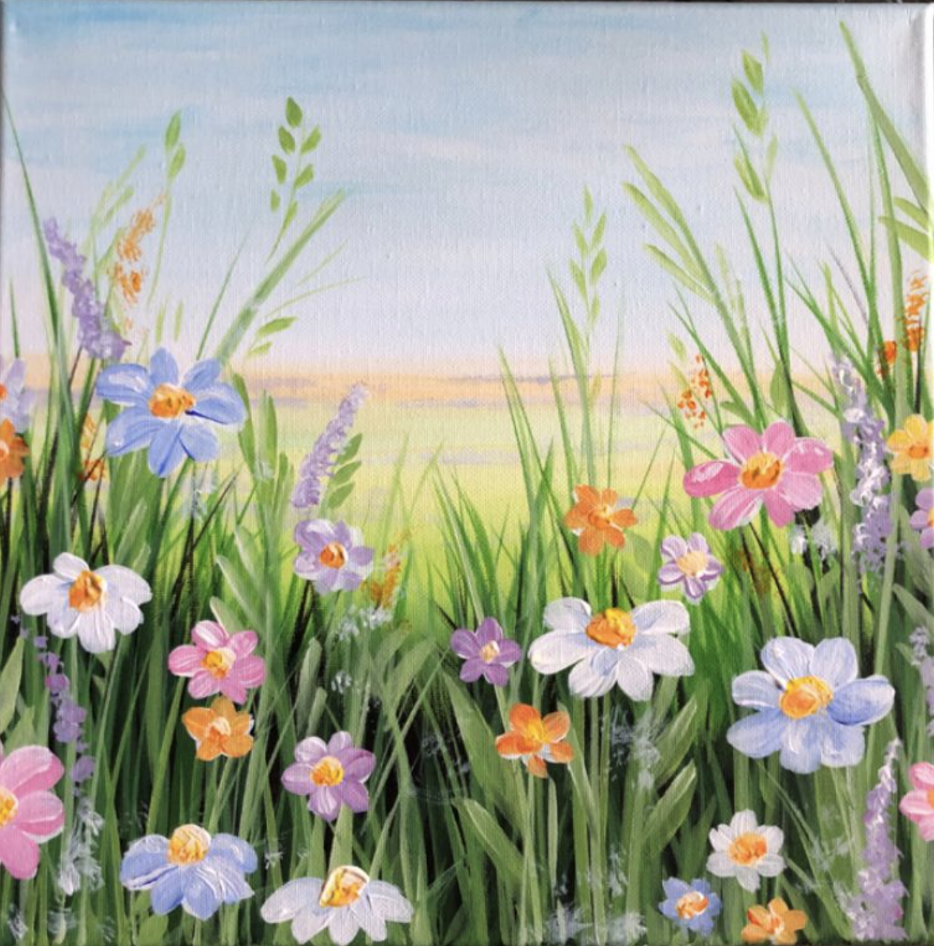 Acrylic painting of colorful wildflowers in a field